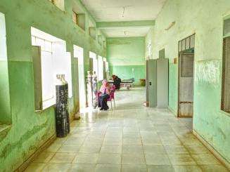 Green empty hallway with windows at Umdawanban hospital in Khartoum, Sudan