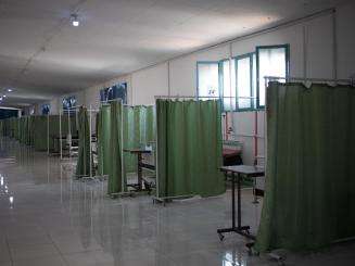 A line of empty hospital beds in a ward in northeast Syria.