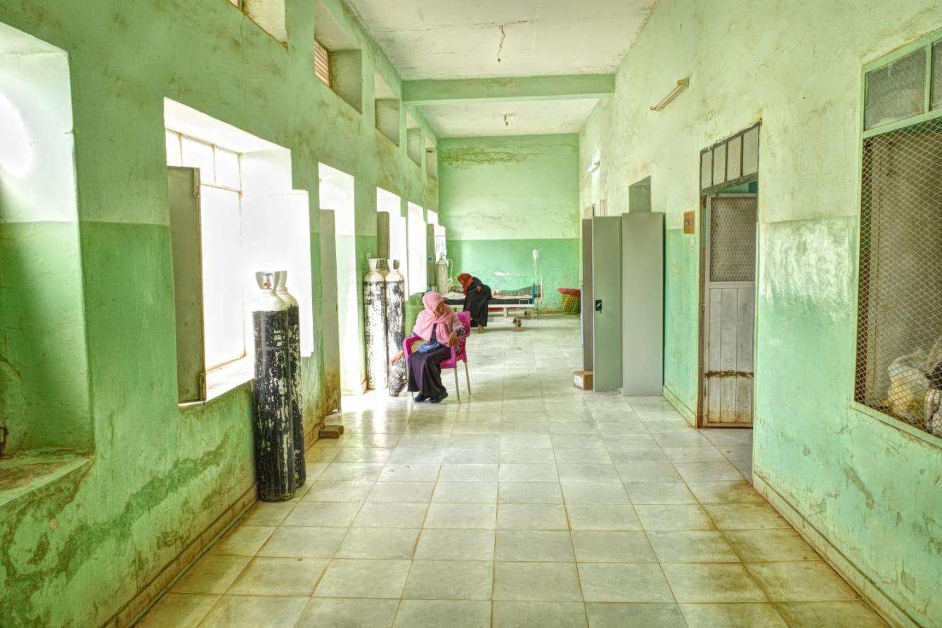 Green empty hallway with windows at Umdawanban hospital in Khartoum, Sudan
