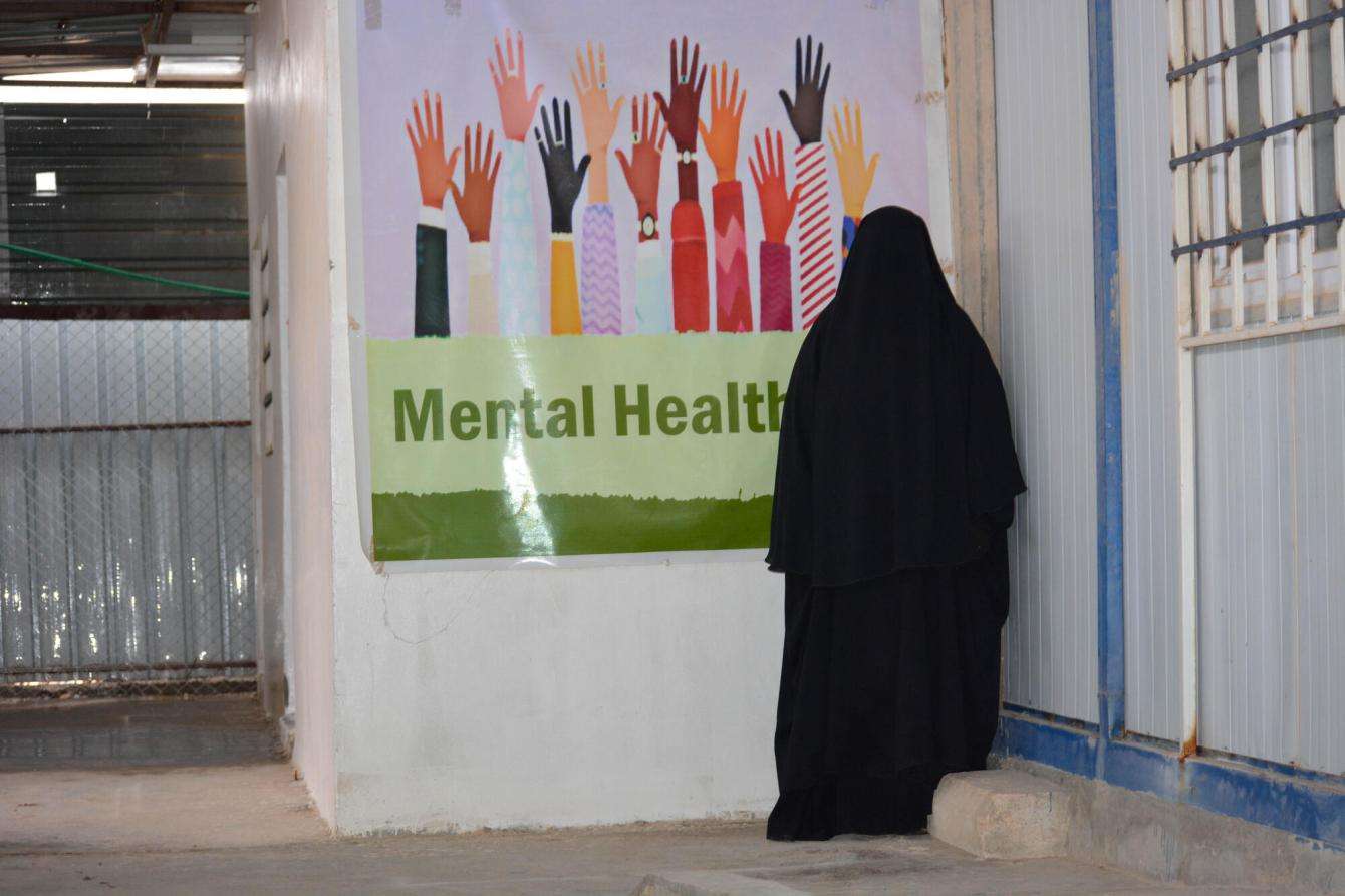 MSF mental health patient, Om Othman, arrives at MSF's clinic for her individual counseling session at Al-Hol camp in December 2023.