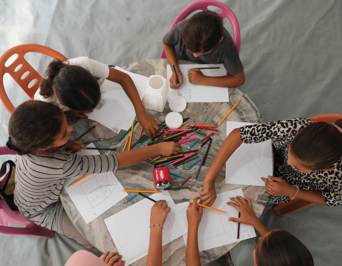 Palestinian children draw to express their feelings during an activity organized by MSF teams at the Zaytoun advanced medical point in Gaza City.