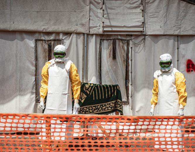 MSF's Ebola treatment center in the Munigi site in Goma, where teams follow a strict preparation and disinfection protocol before and after visiting patients.