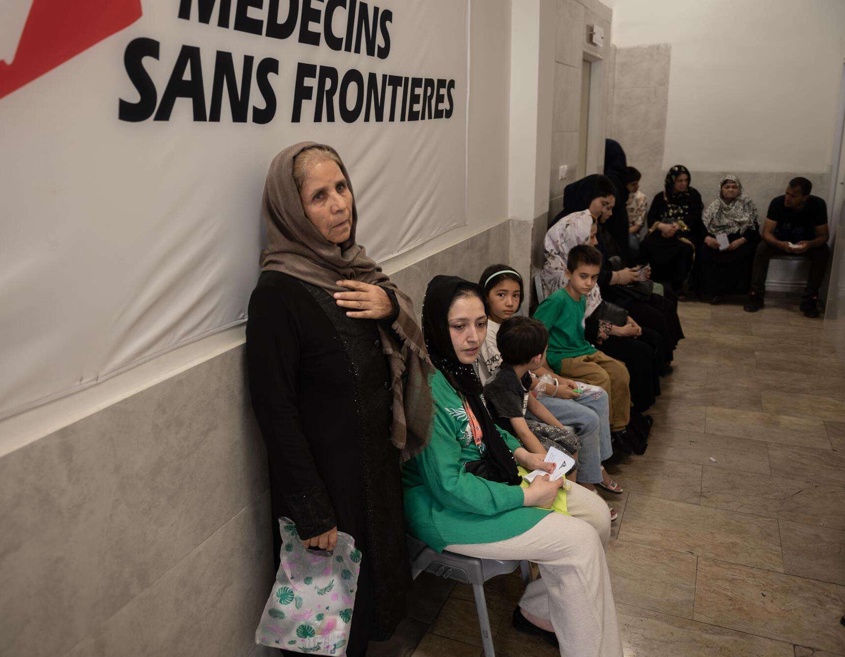 Patients wait to be seen at an MSF-run clinic in Tehran, Iran.