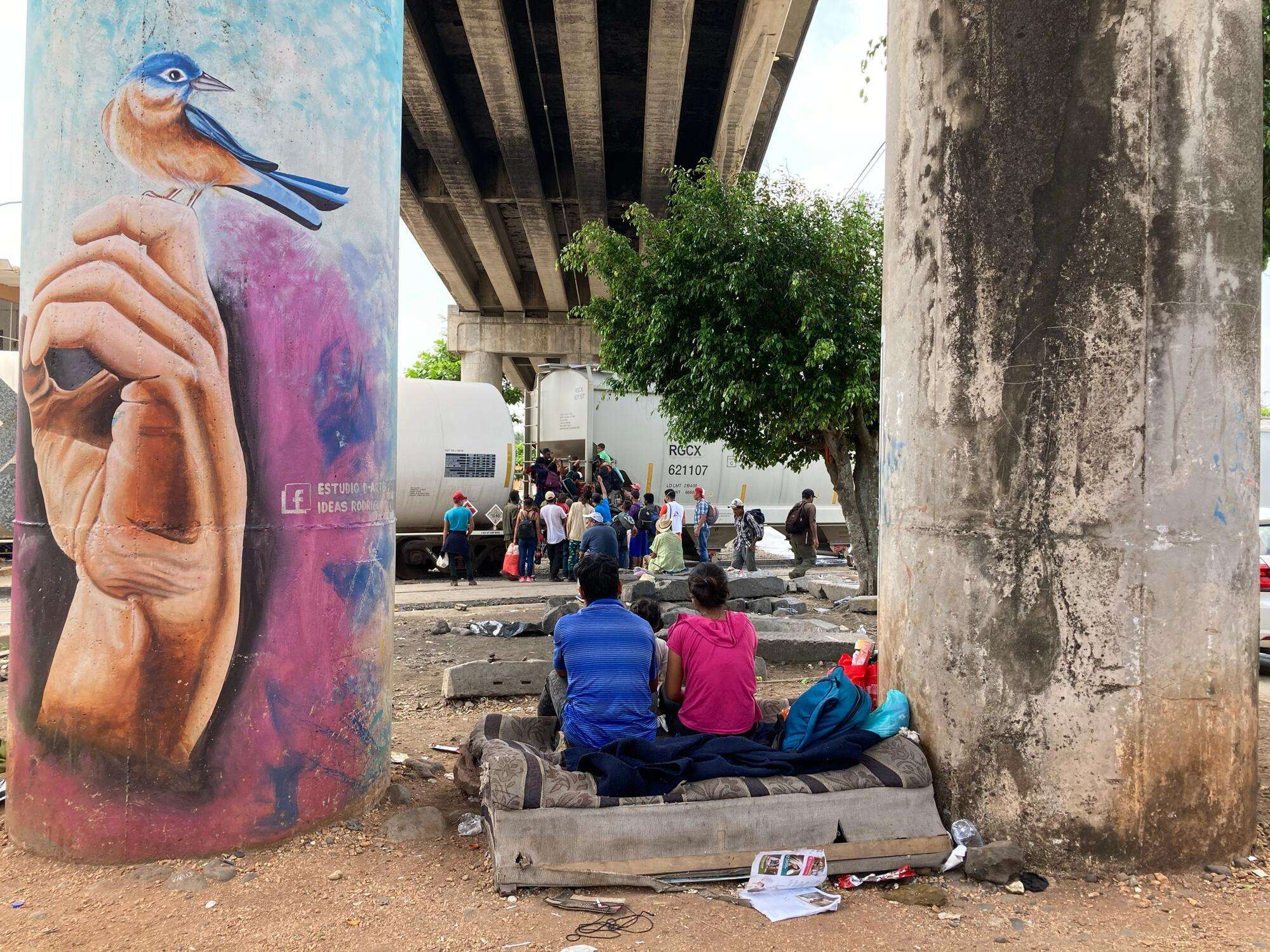 Migrants take shelter under a bridge in the city of Coatzacoalcos, Mexico.