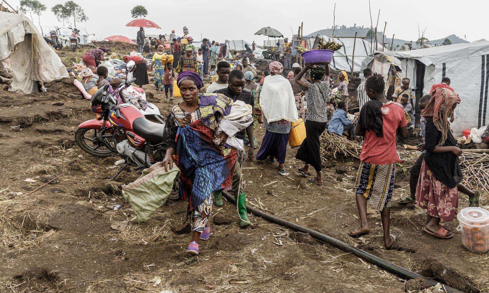 A crowd of displaced people at the Bulengo IDP camp near Goma, Democratic Republic of Congo.