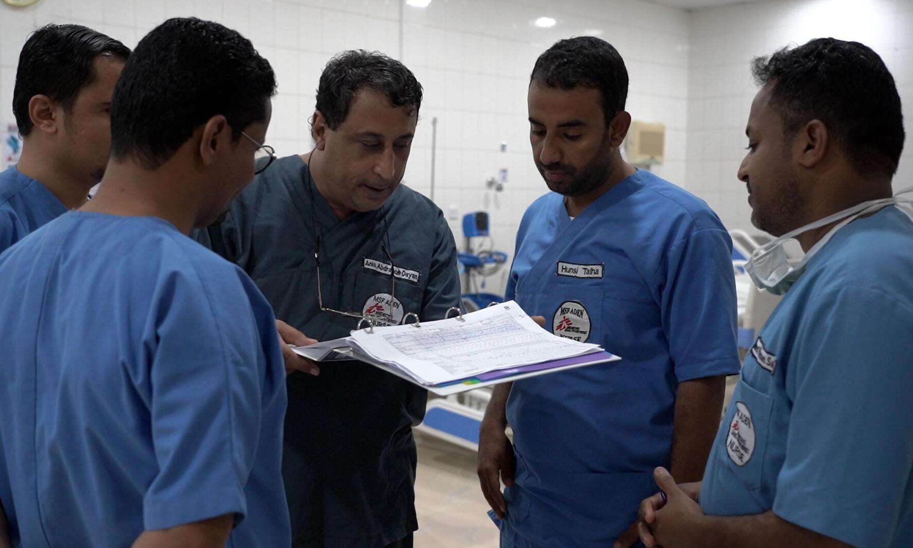 Anis AbdRaboh Dayan and colleagues discussing in ICU