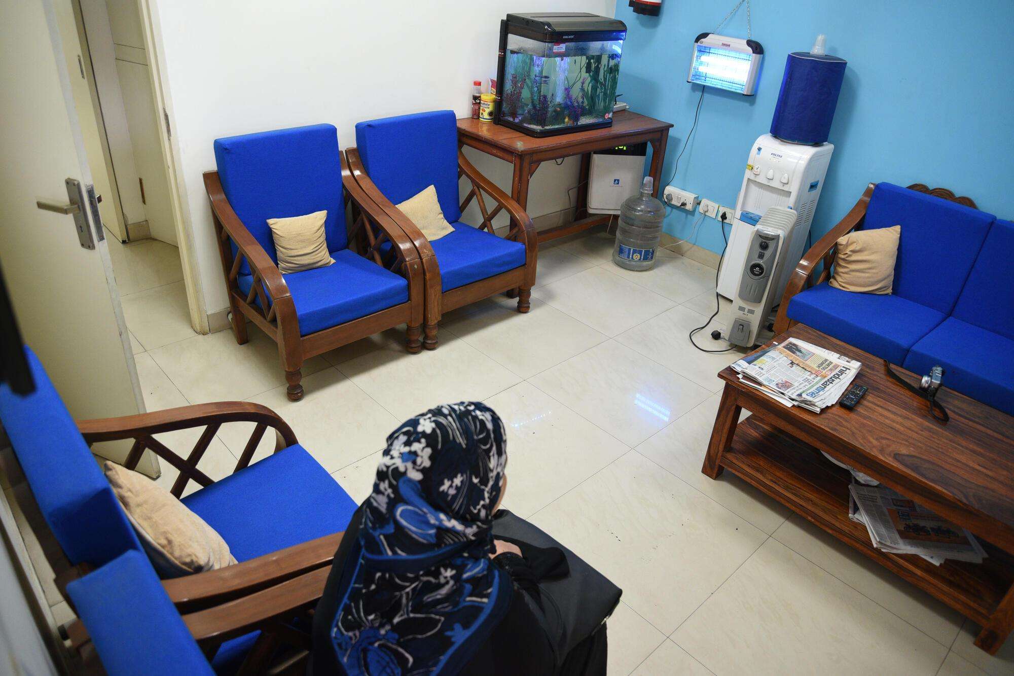 A patient waits for her turn to be examined at the Umeed Ki Kiran Clinic, Jahangirpuri, Delhi