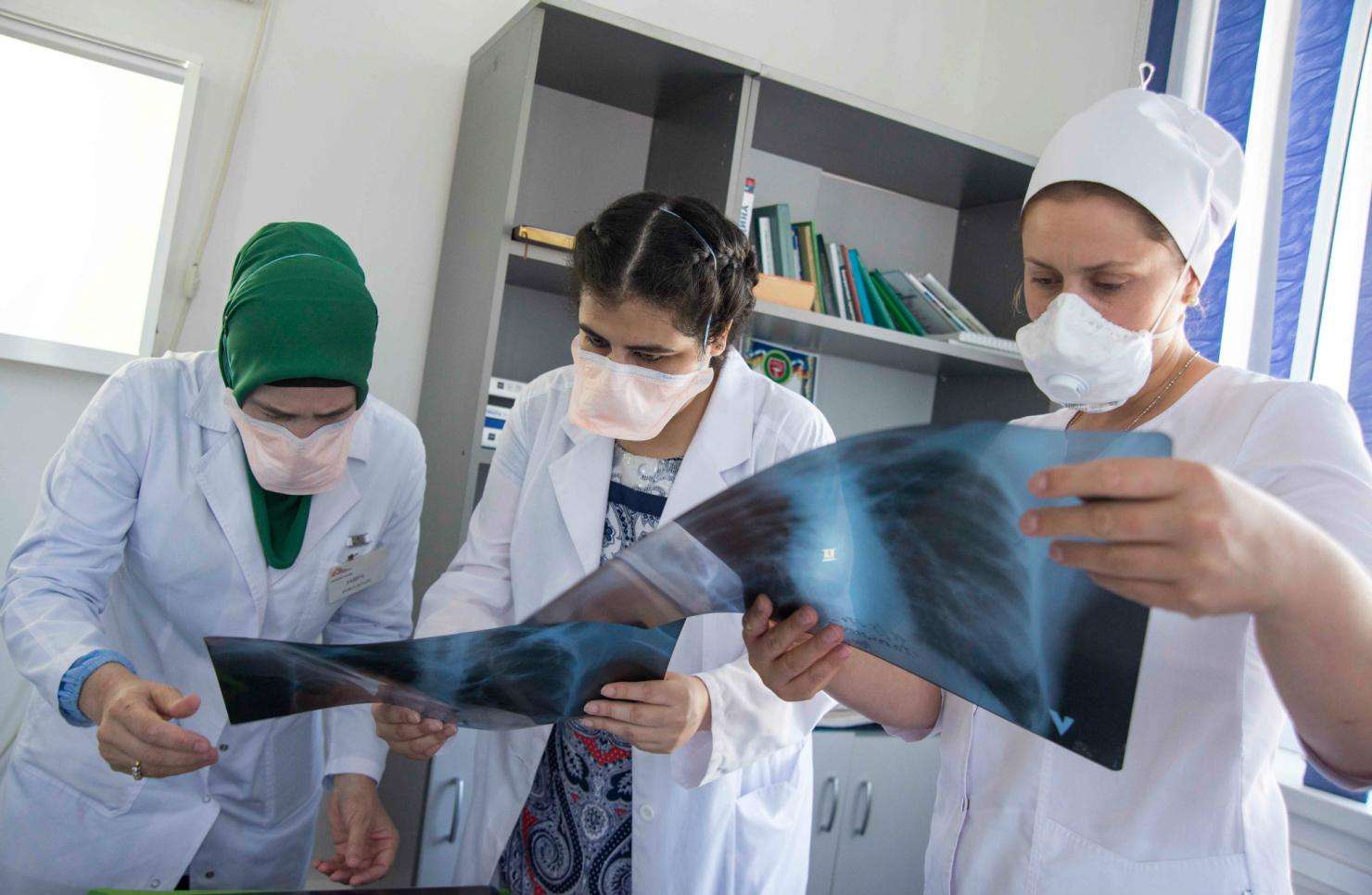 MSF medical staff look at a TB patient's X-ray in Grozny, Chechnya. 