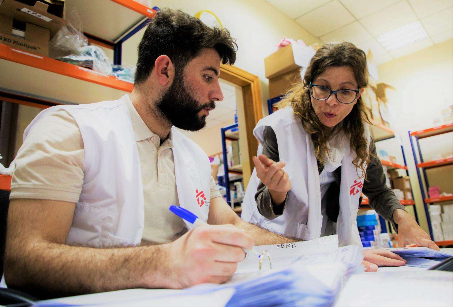 MSF field workers providing logistical support in the pharmacy of Tal Marak hospital in Zummar, north of Mosul, where MSF runs a maternity clinic, an emergency room and a pediatric inpatient department.