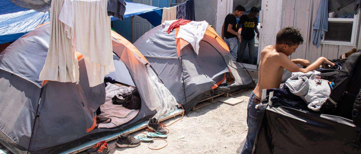 Many asylum seekers are forced to sleep in tents near the border.