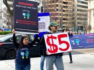 MSF staff and supporters protest in front of Danaher's headquarters in Washington, D.C.