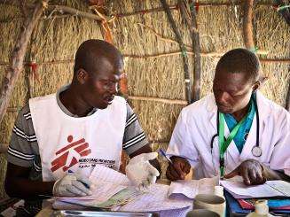 Staff working at a mobile clinic set up by MSF at the Tataveron IDP site, Lake Chad.