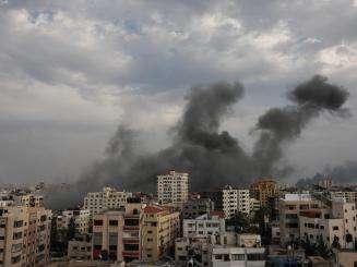 Smoke over Gaza after Israeli airstrikes on October 9.