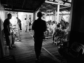Patients wait in the reception area at MSF's clinic in Yangon