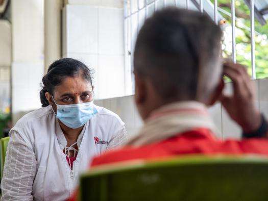 Sameer*, a patient living with advanced HIV, talks to a counselor at the Guru Gobind Singh Hospital in Patna, Bihar.