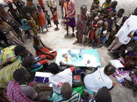 A community gathers for measles vaccinations in Kenya. 