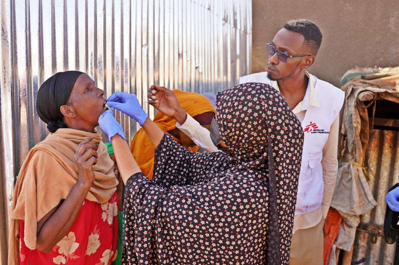 MSF staff and CATI members administering oral cholera vaccines to a household in Jigjiga, Ethiopia on 2nd February 2024