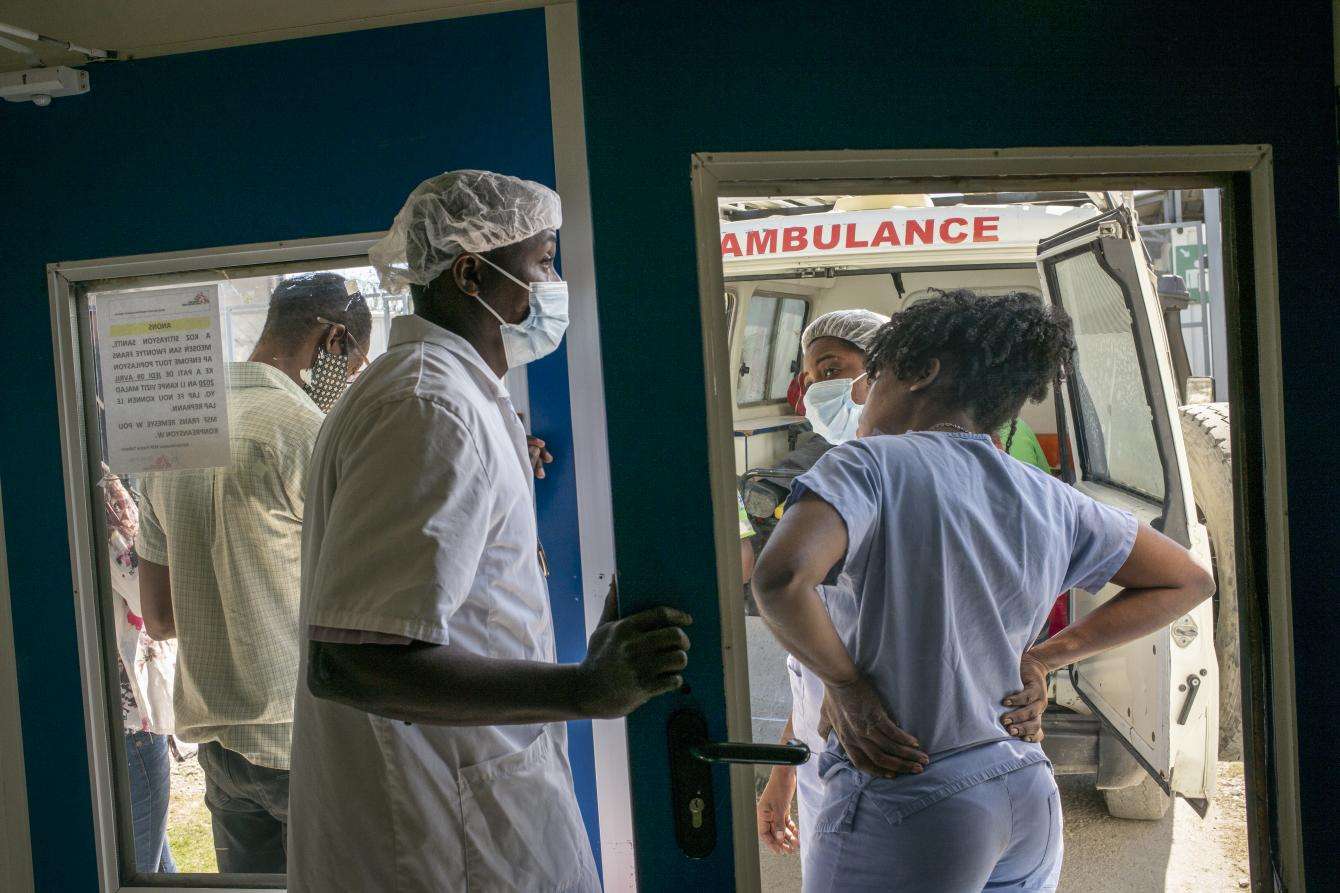 Medical staff await the arrival of a hospital at MSF Tabarre hospital.