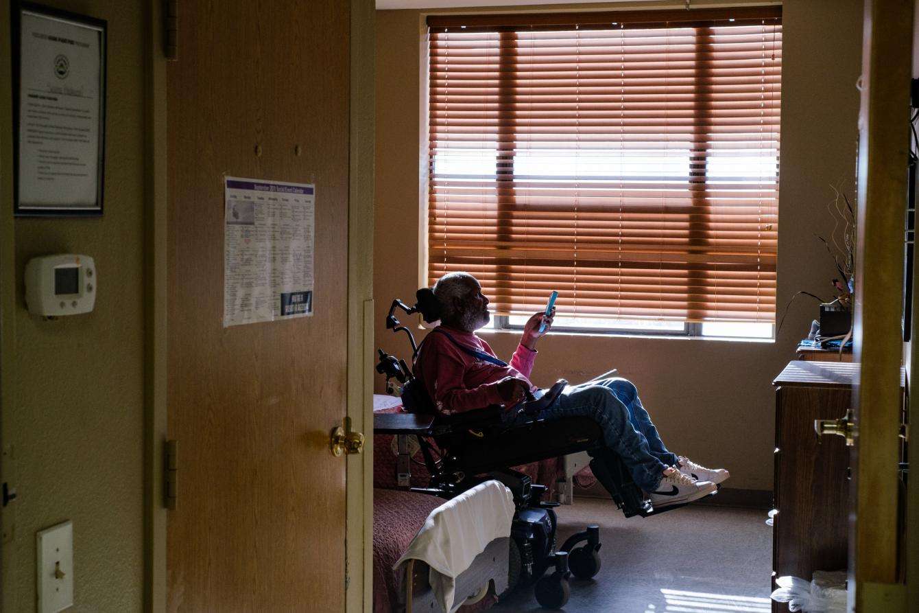 A resident at Focused Care at Beechnut, a long term care facility in Houston, Texas, watches TV inside his room. MSF conducted infection prevention and control (IPC) training and mental health and wellness training with medical and non-medical staff at Beechnut and other nursing homes in Houston during the summer and fall of 2020.