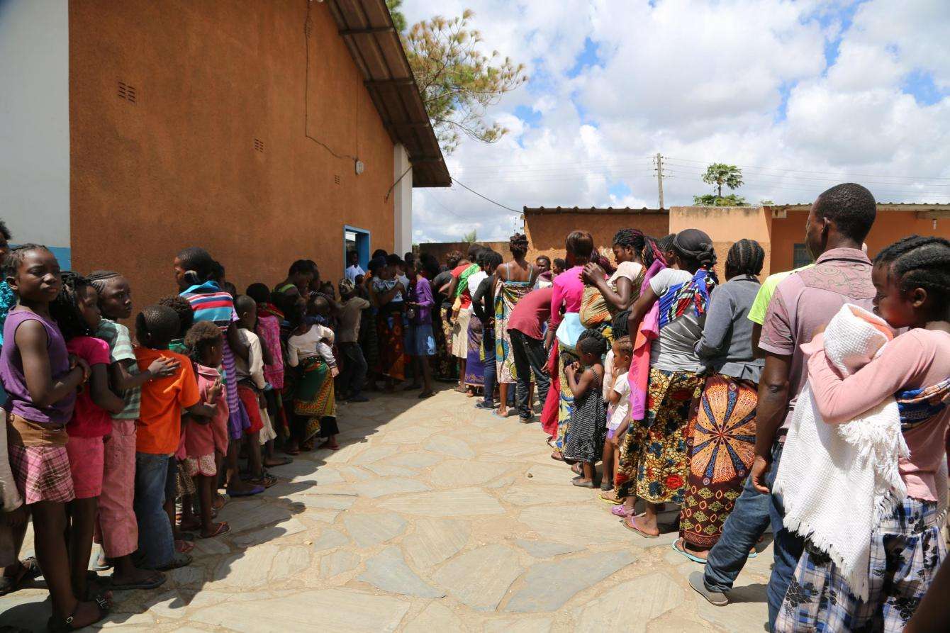 Scores of people line up to receive cholera vaccinations in Lusaka.