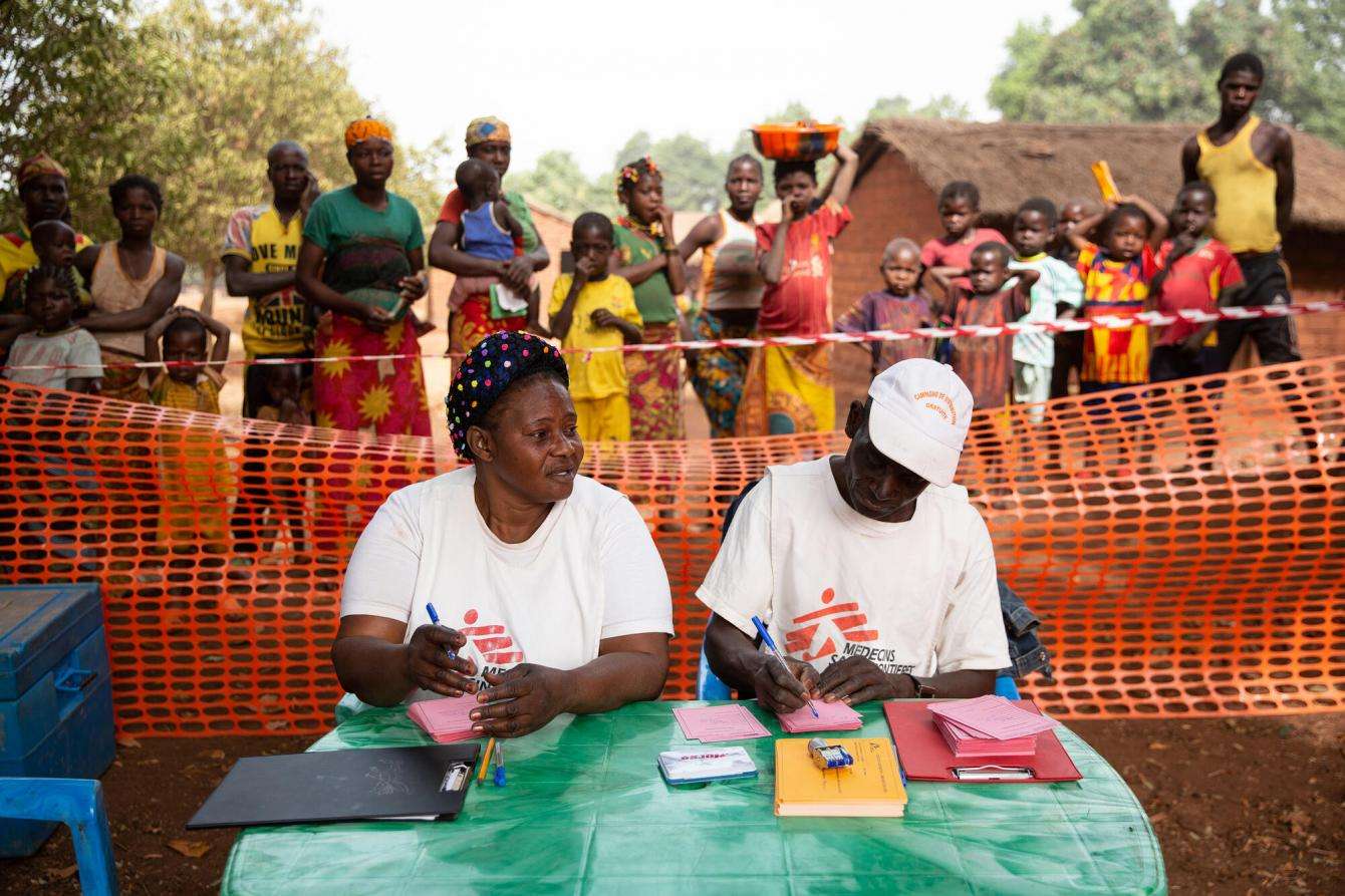 An MSF team prepares to admit patients at a measles vaccination clinic