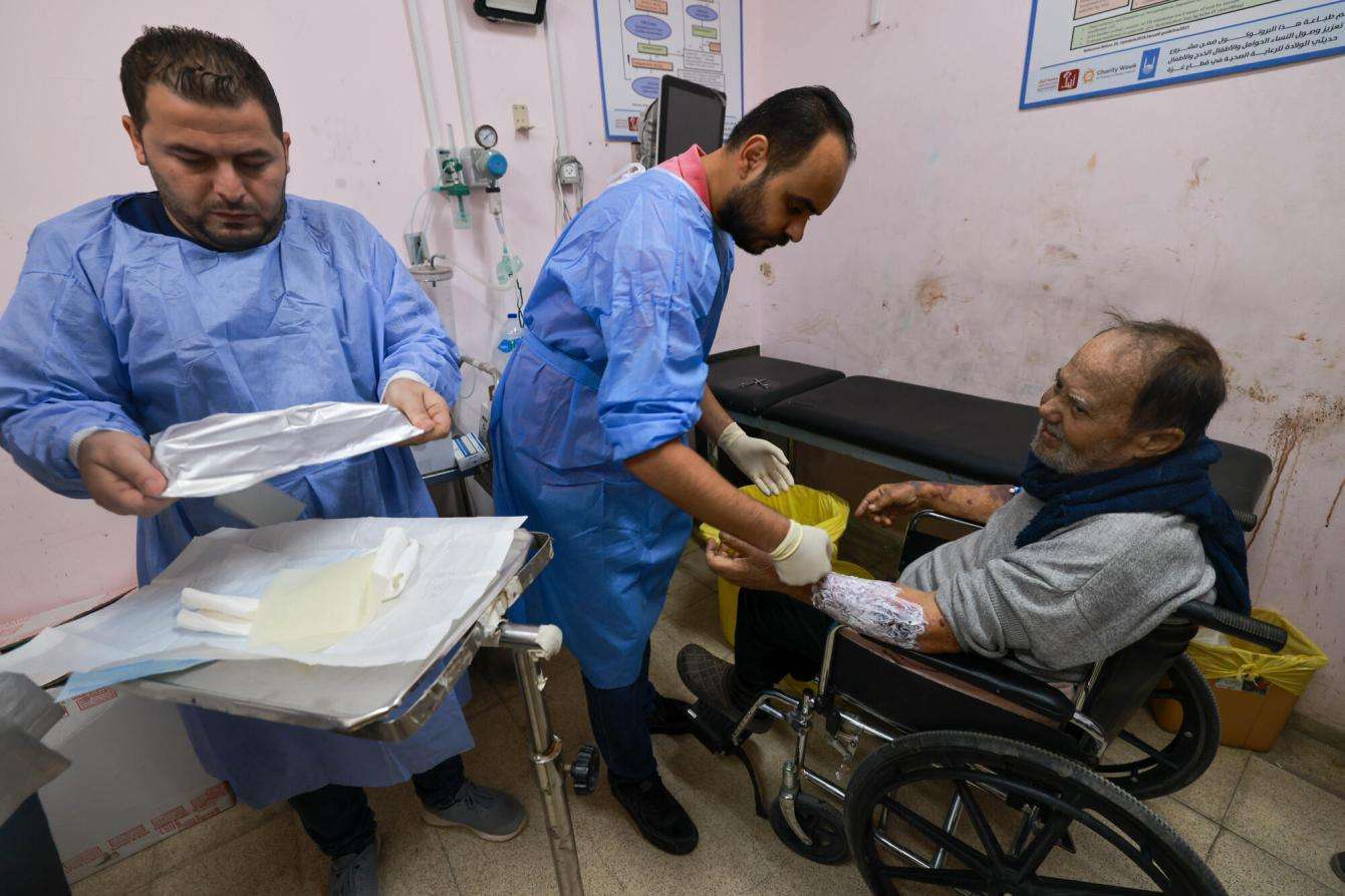 A patient receiving a new dressing at Al Aqsa hospital. 29 November 2023, Middle Area, Gaza.