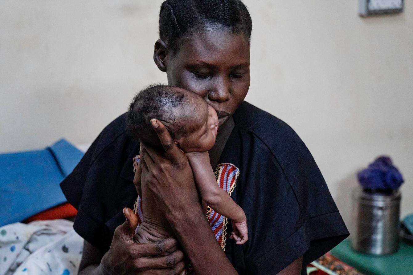 A woman and child at Ameth Bek Hospital in Abyei, South Sudan.