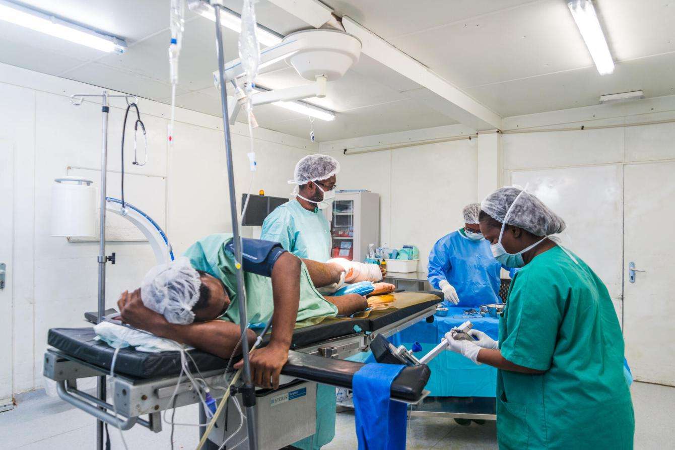 A gunshot victim has an operation in Haiti. 