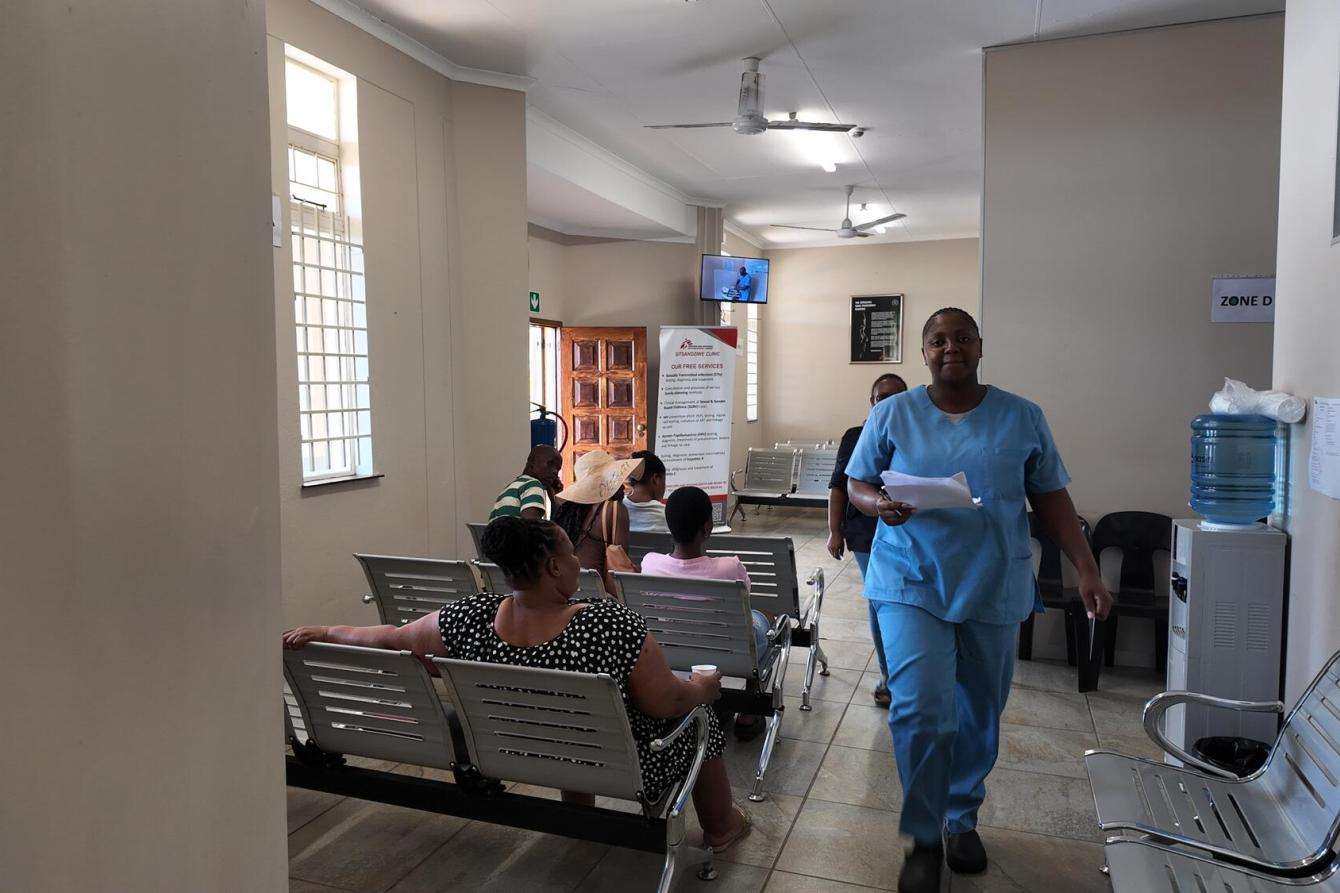 Dr Tandzile Nhlengetfwa walks through the waiting area in the Sitsandziwe Clinic, Eswatini