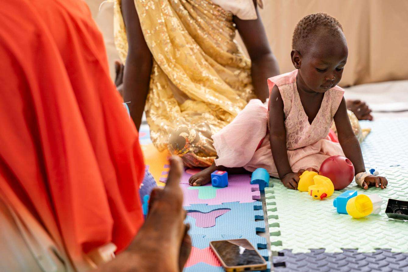 Child playing with blocks during play therapy session in Ethiopia. 