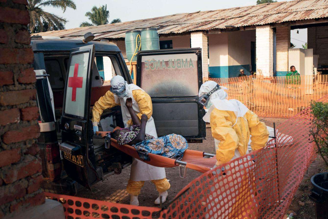 A patient in critical condition is transferred to the Ebola treatment center operated by MSF at Mongbwalu General Hospital, DR Congo.