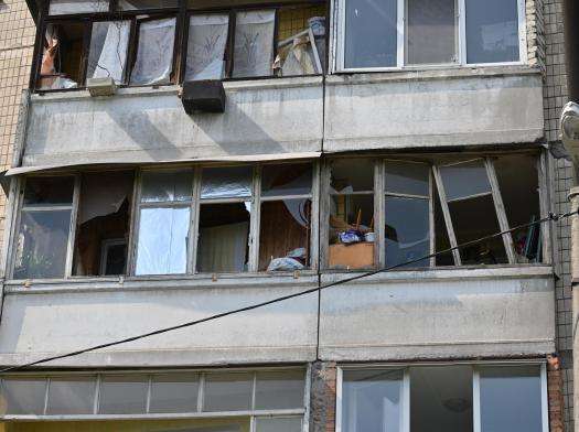 Damaged building with broken windows after a missile strike in Dnipro, Ukraine