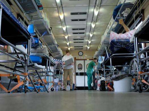 A medical room inside of a train car.