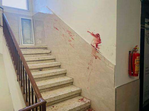 Blood on the wall in the stairwell of Al-Awda Hospital in Gaza in November 2023.
