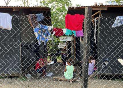 Hundreds of migrants arrive at reception centres after travelling through Darien jungle