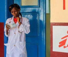 A doctor in Central African Republic does a remote consultation with a colleague. 