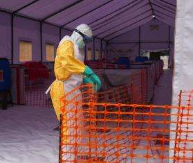 A health worker wears full PPE in Kenya. 