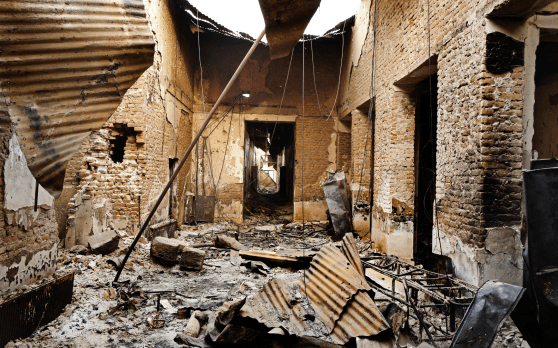 Iron roofing and rubble litter a corridor in the MSF Kunduz Trauma Centre as the facility lies destroyed following the 03 October aerial attack which killed 22 staff and patients in northern Afghanistan.